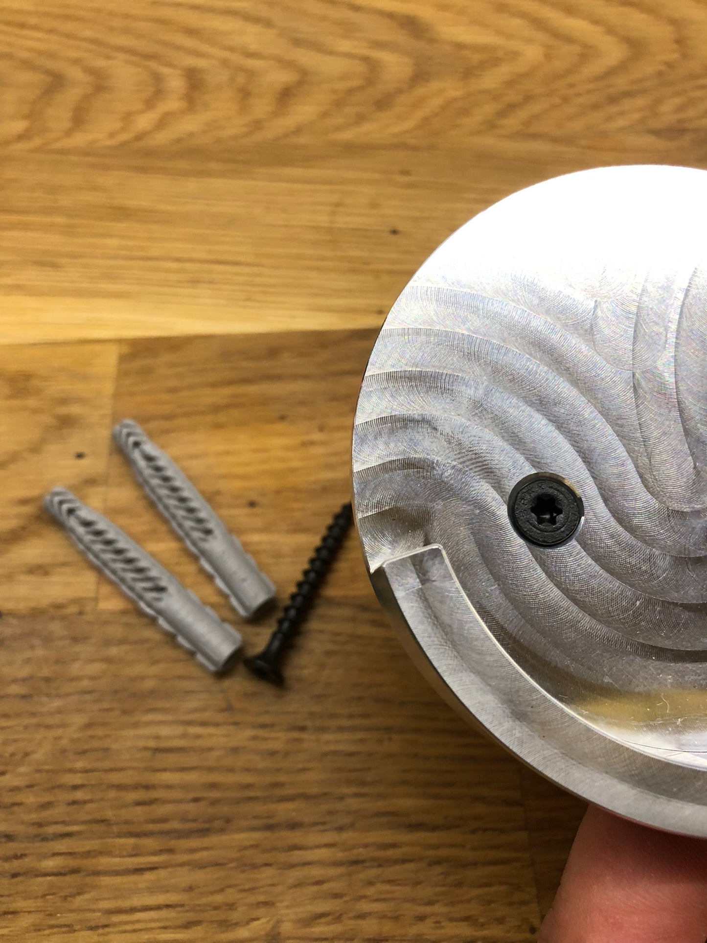 Befestigungsmaterial für eine Wandhalterung